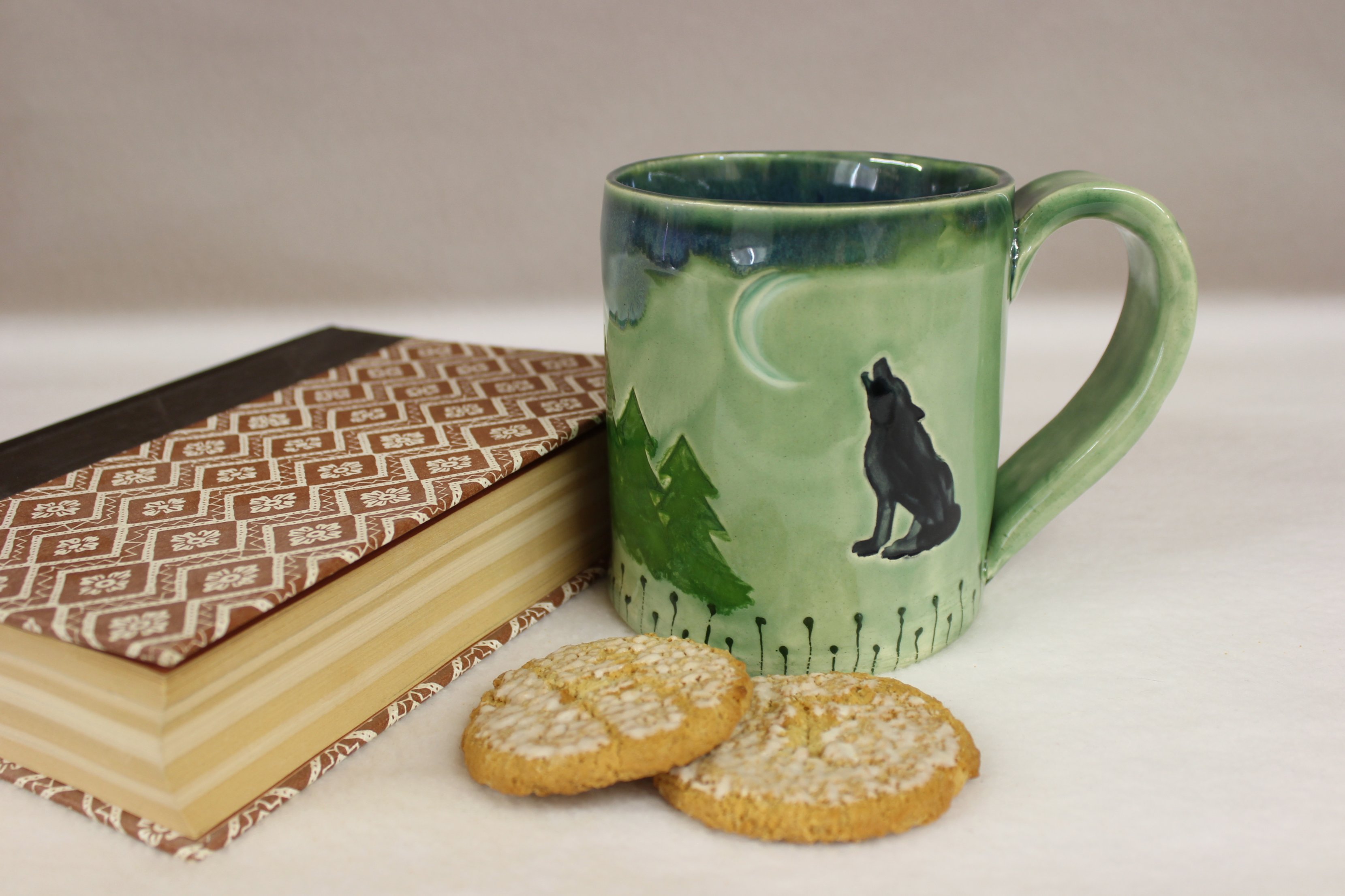 forest-wolf-song-ceramic-coffee-mug-howling-at-a-crescent-moon-wild